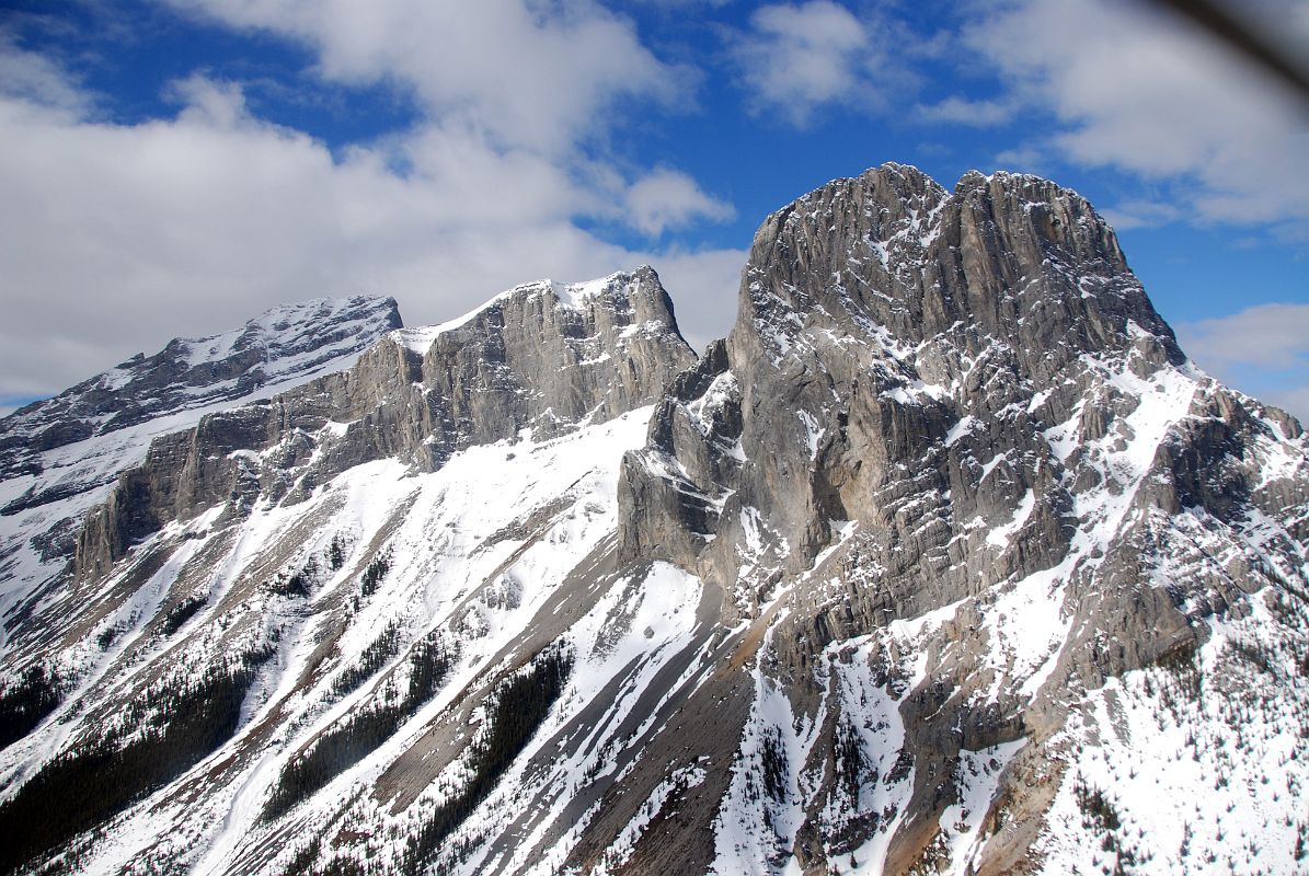 11 The Three Sisters - Faith Peak, Hope Peak and Charity Peak From Helicopter After Takeoff From Canmore To Mount Assiniboine In Winter
